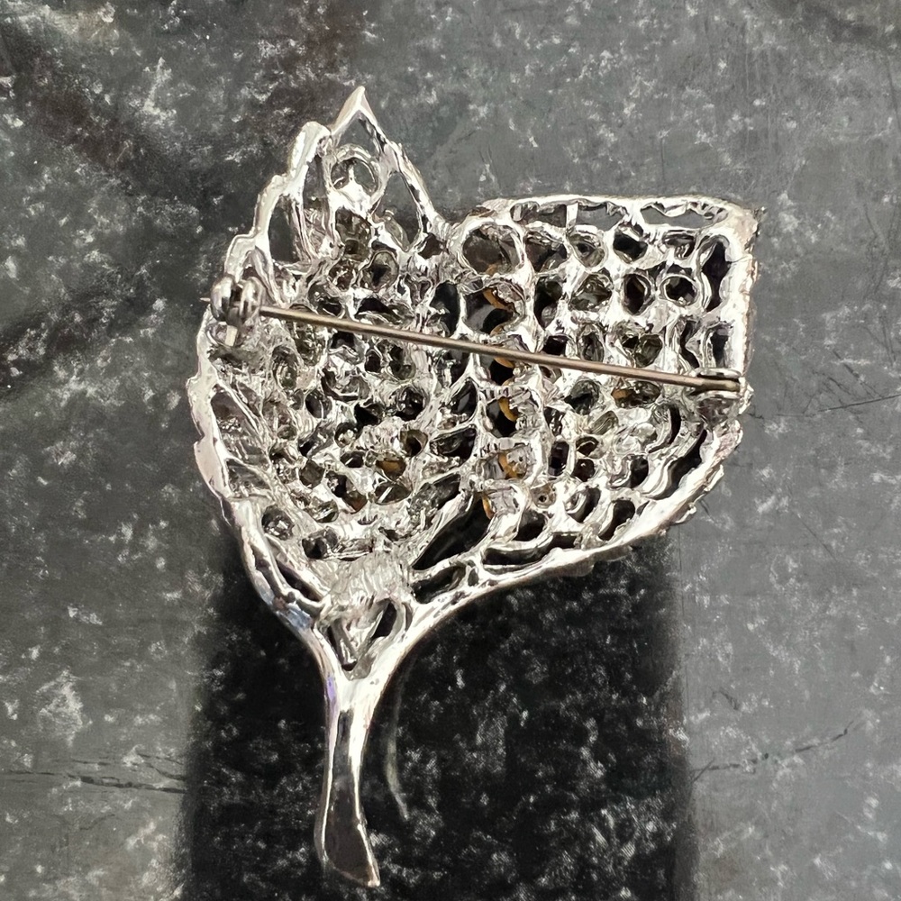 Vintage Silvertone leaf with clear rhinestone brooch